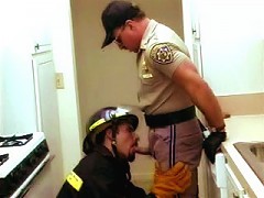 Hairy and horny gay police officers engaging in a lust-filled satisfaction.